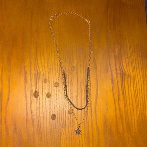 Gold double layered star necklace